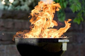 raging-fire-from-charcoal-barbecue-grill